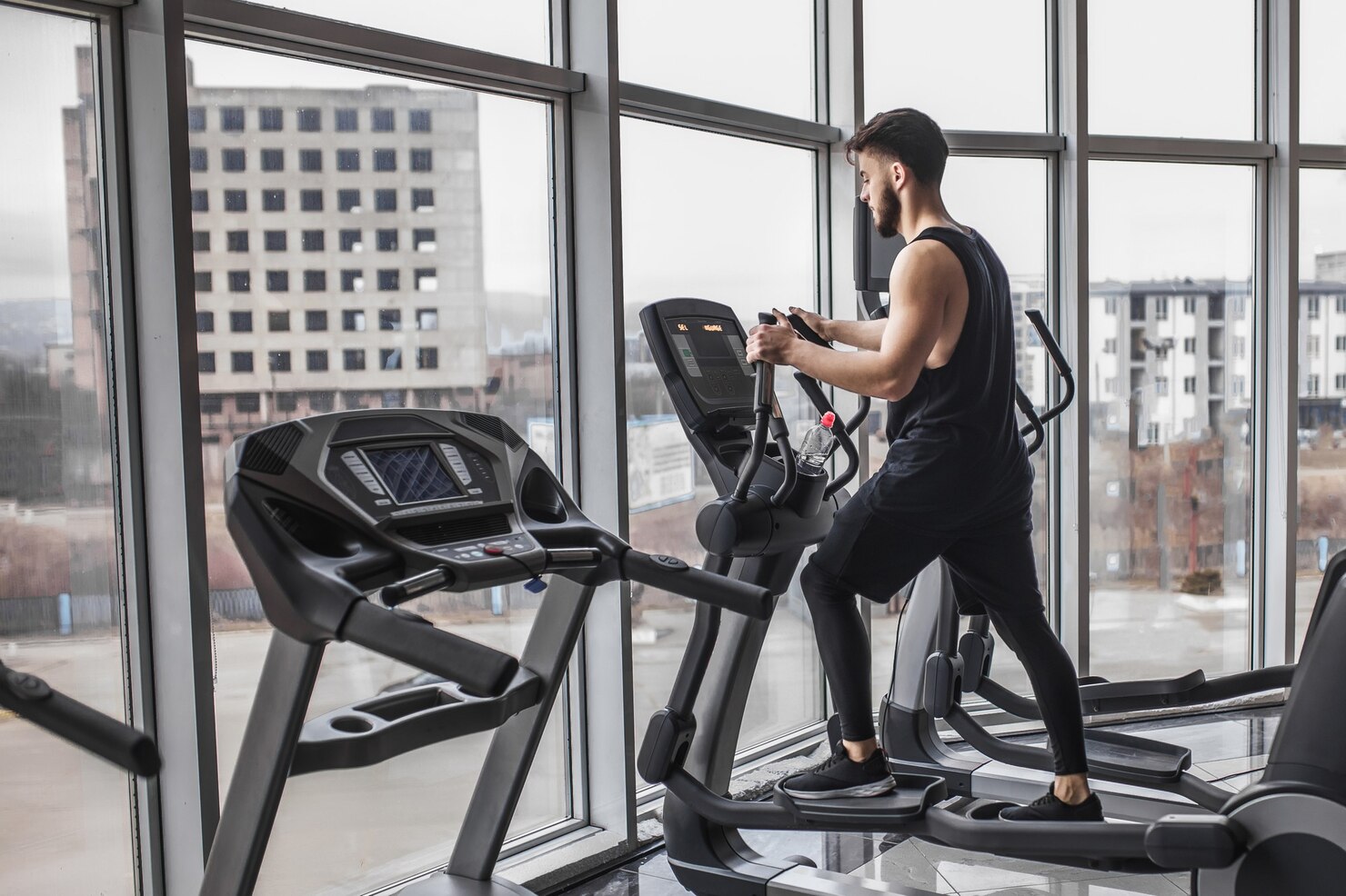 young bodybuilder running cardio workout looking gym window 496169 2718